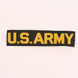 US Army Gold on Black Tape Worn Over Jacket Breast Pocket